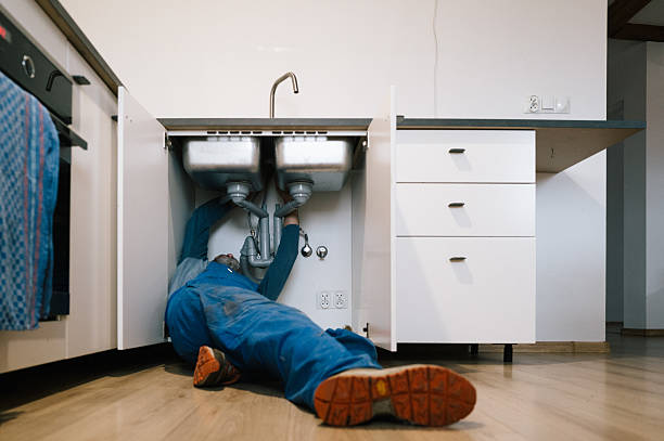 Professional Emergency Plumber technician working in Brookside, DE